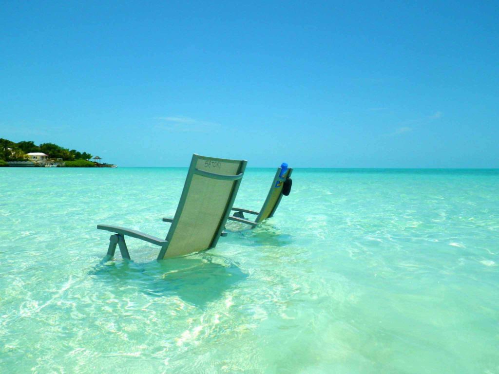 grace bay chairs on the beach