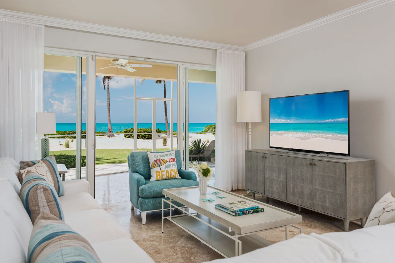 Caribbean-influenced living room at the tuscany resort on Grace Bay Beach