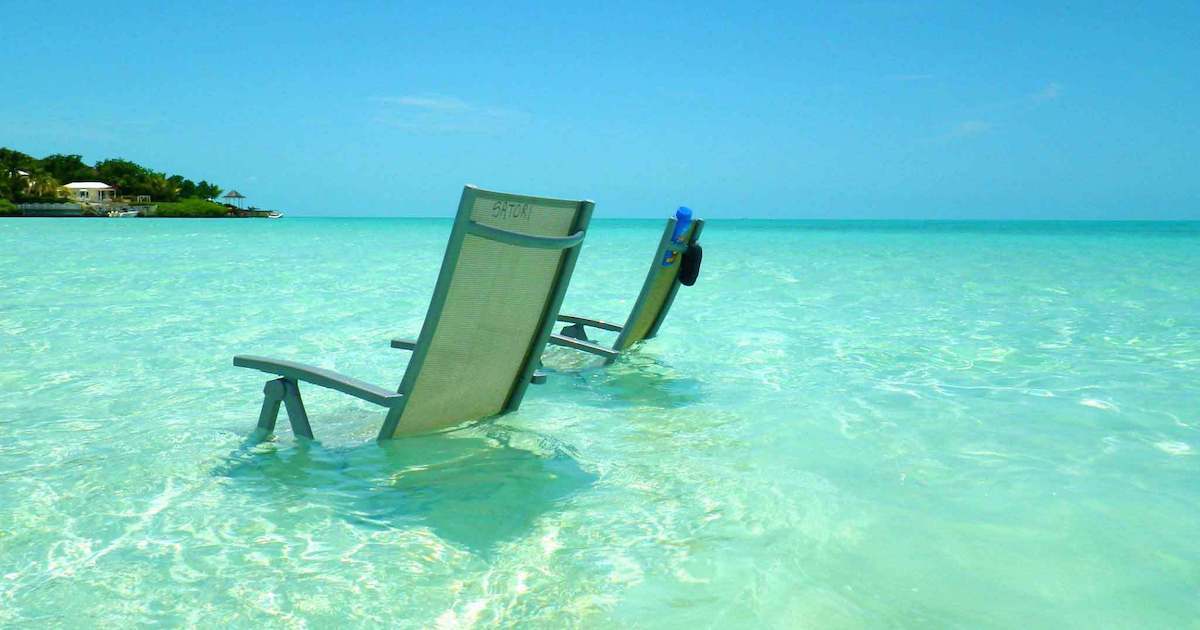 Enjoying the perfect beach waters while visiting Turks and Caicos