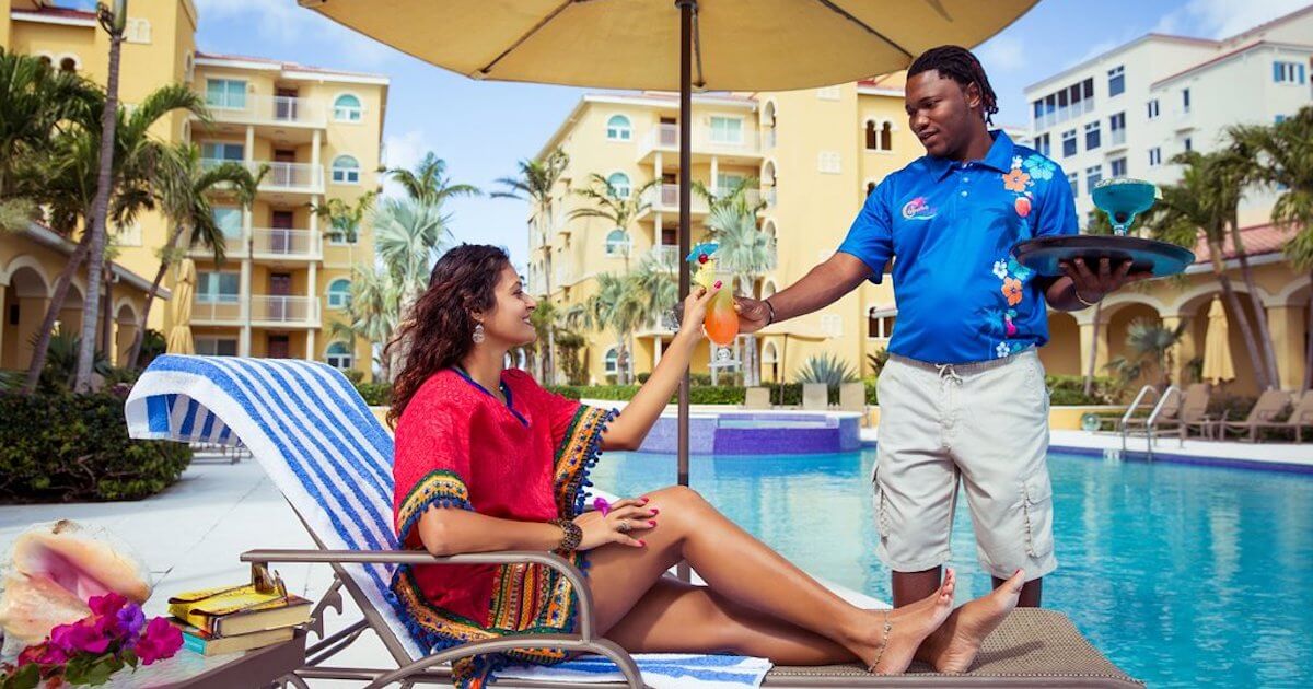 Guests at The Tuscany, a boutique resort in Turks and Caicos, enjoy exclusive amenities and personalized services including beachfront and poolside service.